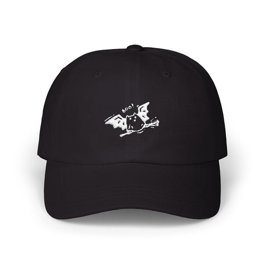 Black cap with a white graphic design on a white background
