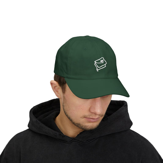 Person wearing a green cap with a white icon on a white background