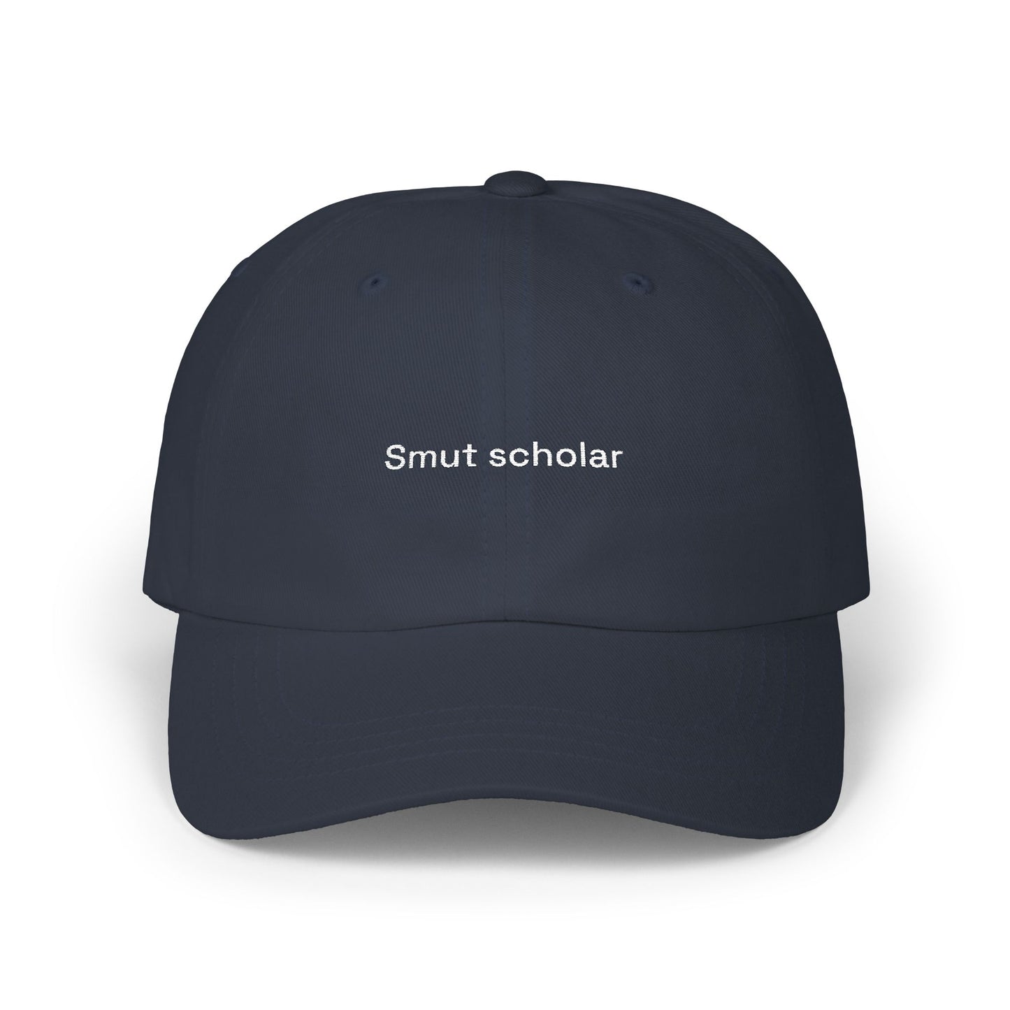 Navy blue cap with 'Smut scholar' text on a white background
