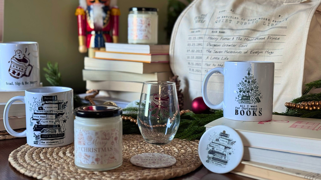 Book lover Christmas gifts including mugs, candle, and tote bag by The Quiet Shelf