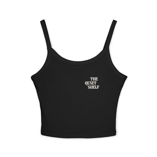 A black spaghetti strap crop tank top with 'THE QUIET SHELF' text on the chest area.