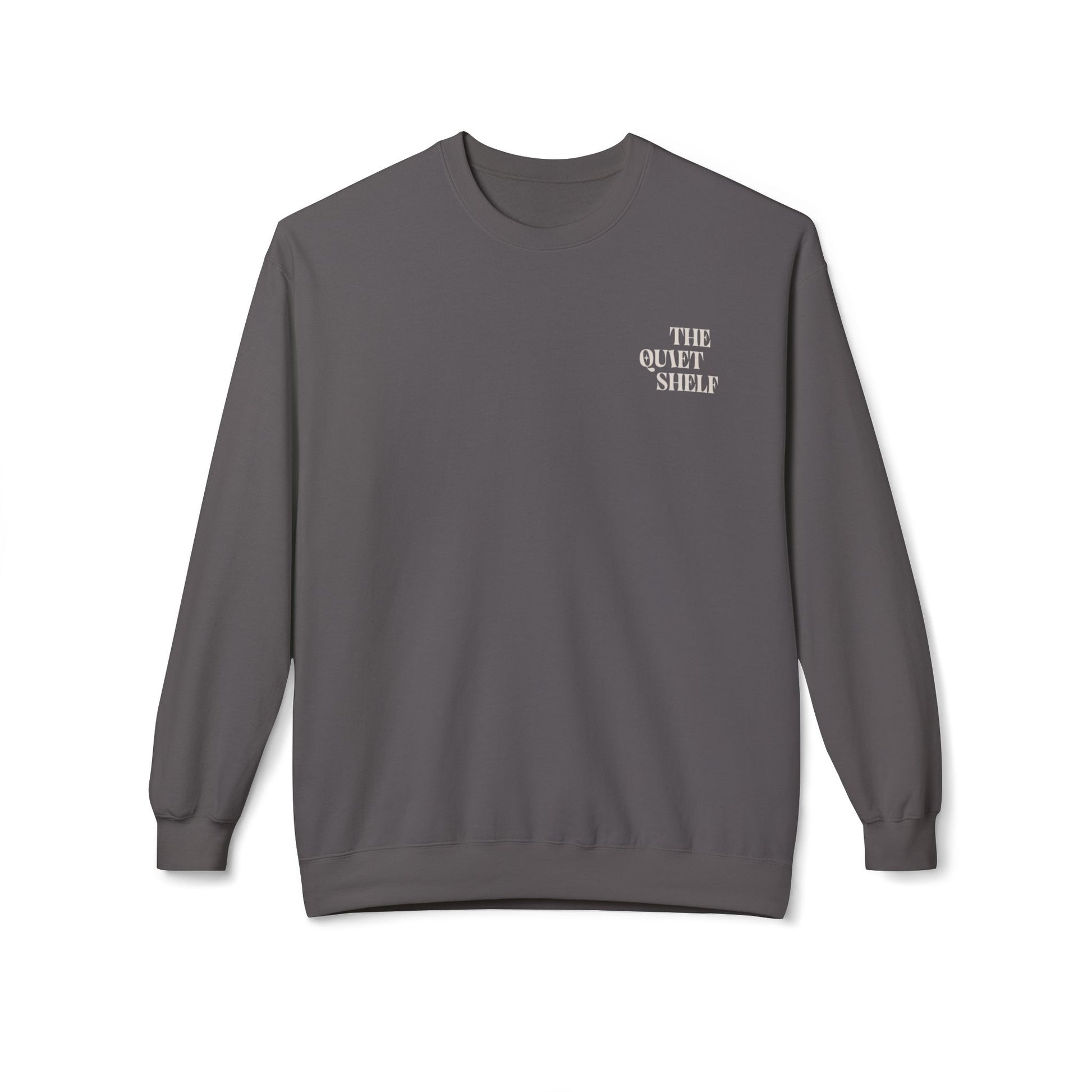 A crewneck sweatshirt with 'THE QUIET SHELF' written in a small, bold font on the upper left front side.