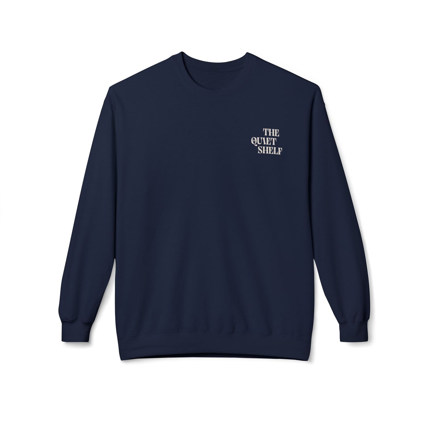 A navy blue crewneck sweatshirt with 'THE QUIET SHELF' written in a small, bold font on the upper left front side.