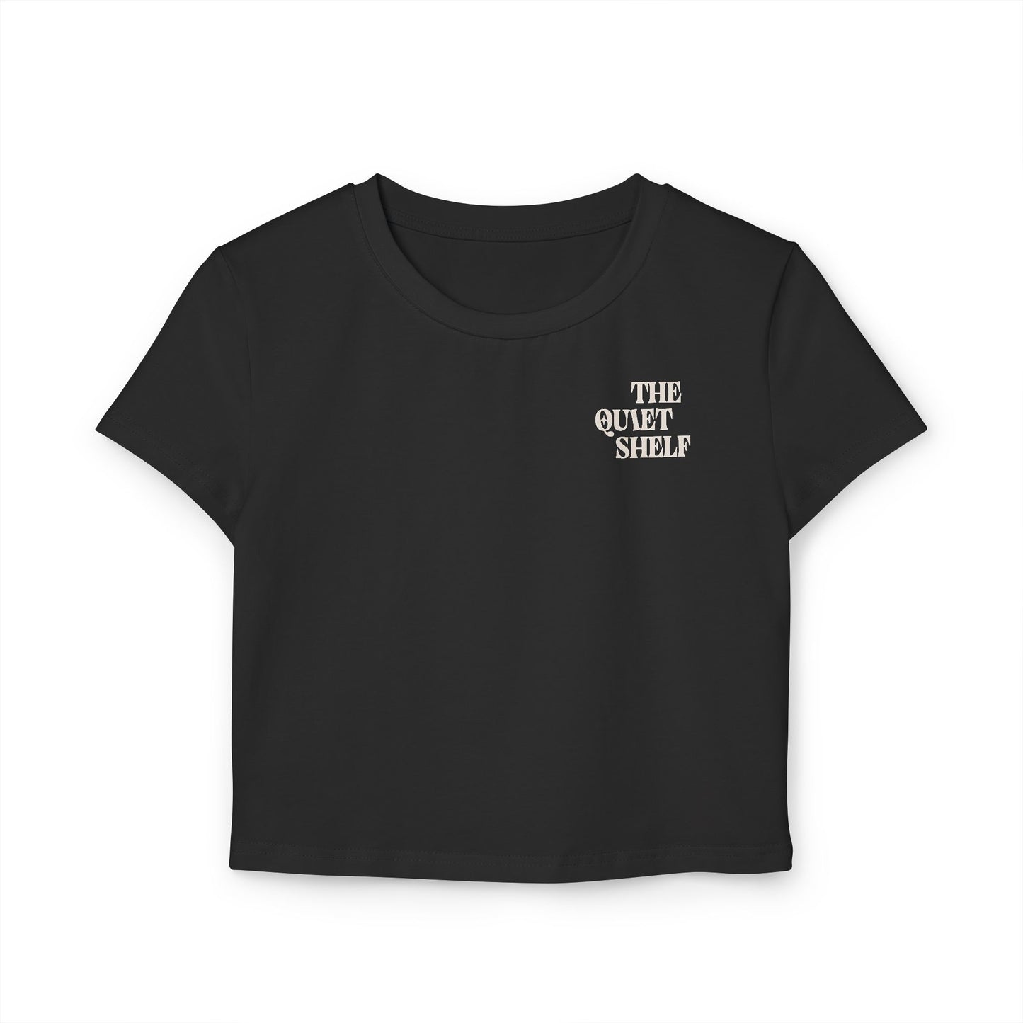 A black cropped tee with 'THE QUIET SHELF' logo printed on the upper left chest area.