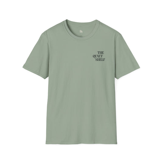 A green unisex crew neck t-shirt with 'THE QUIET SHELF' text on the upper left side.