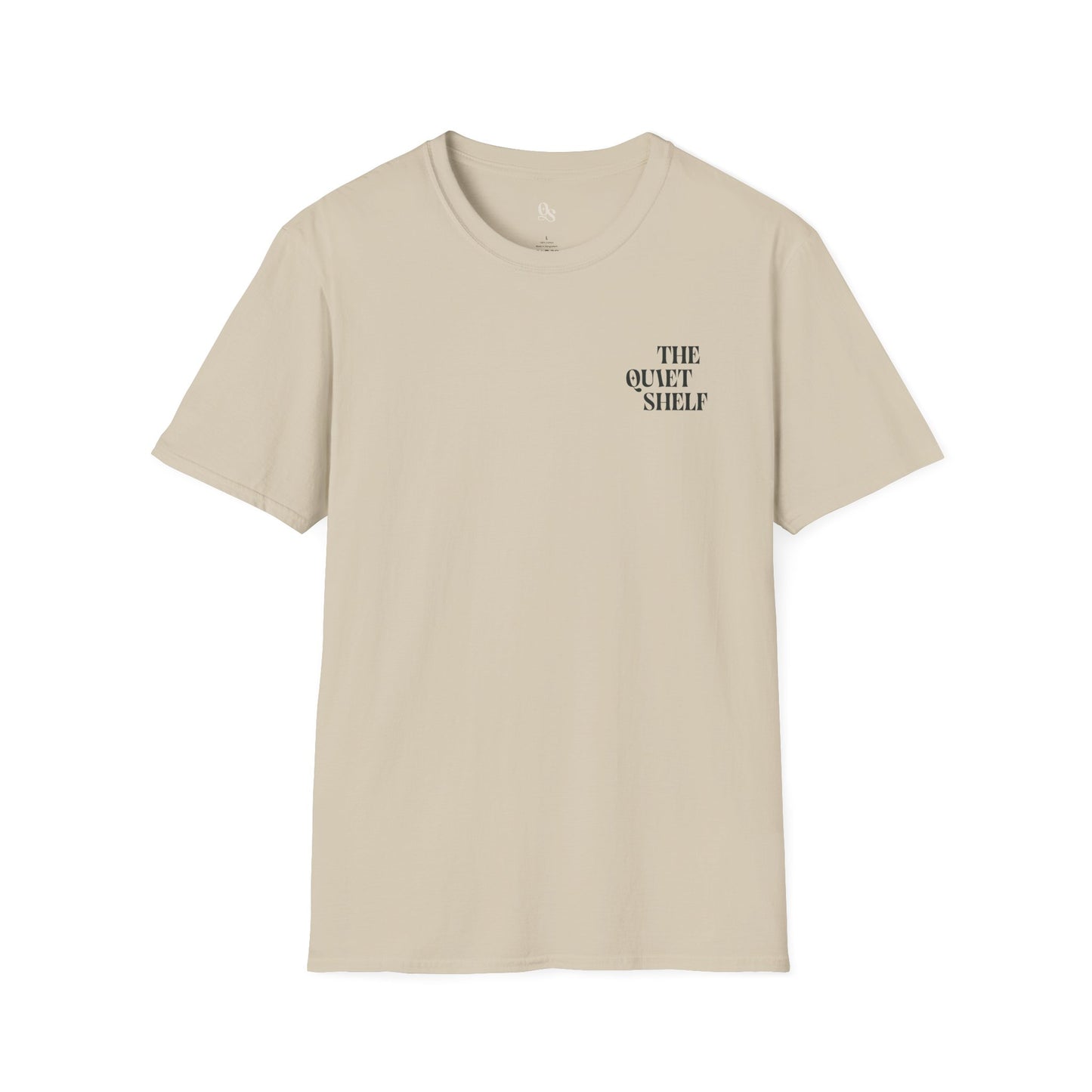 A beige unisex crew neck t-shirt with 'THE QUIET SHELF' text on the upper left side.