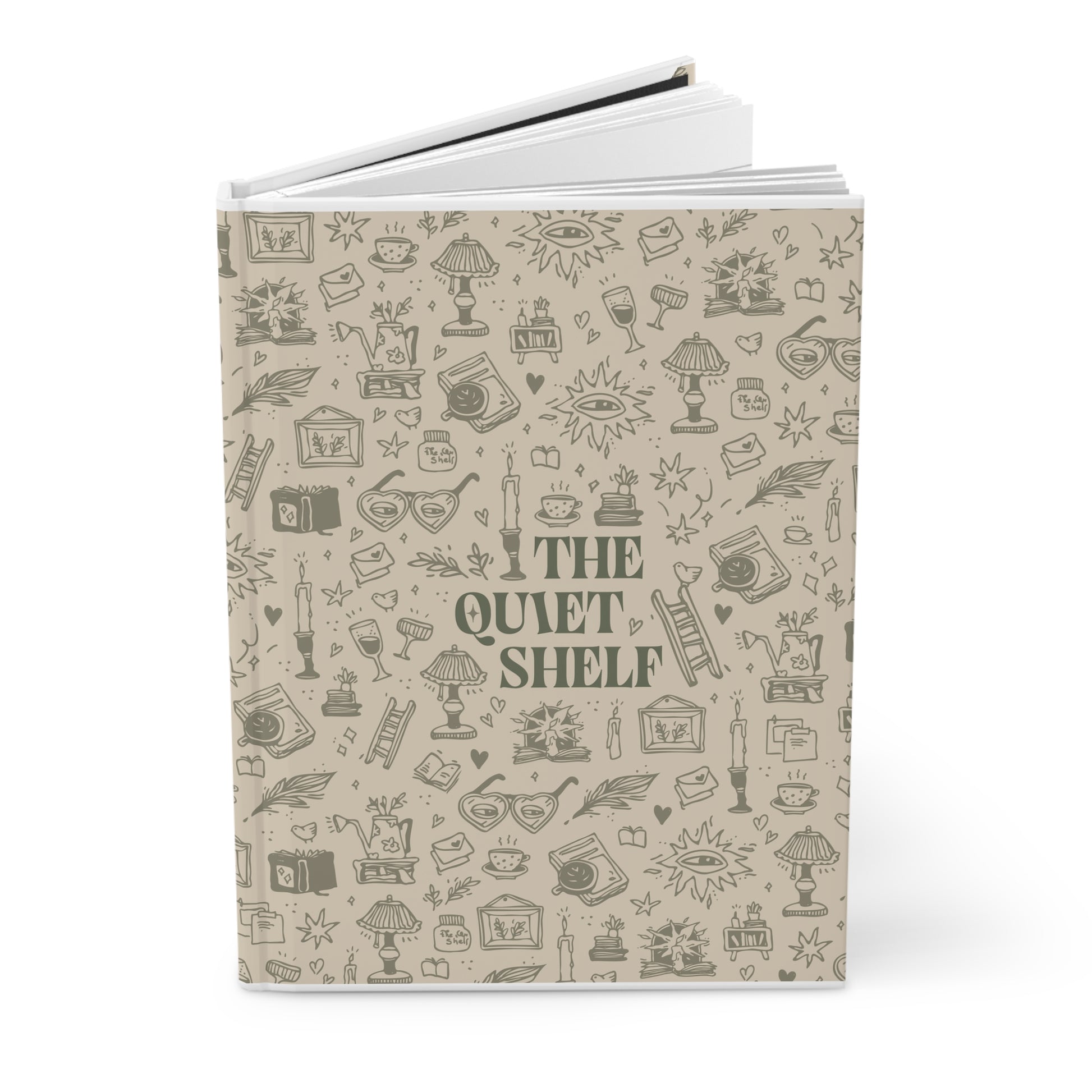 Notebook with 'The Quiet Shelf' design on a beige background