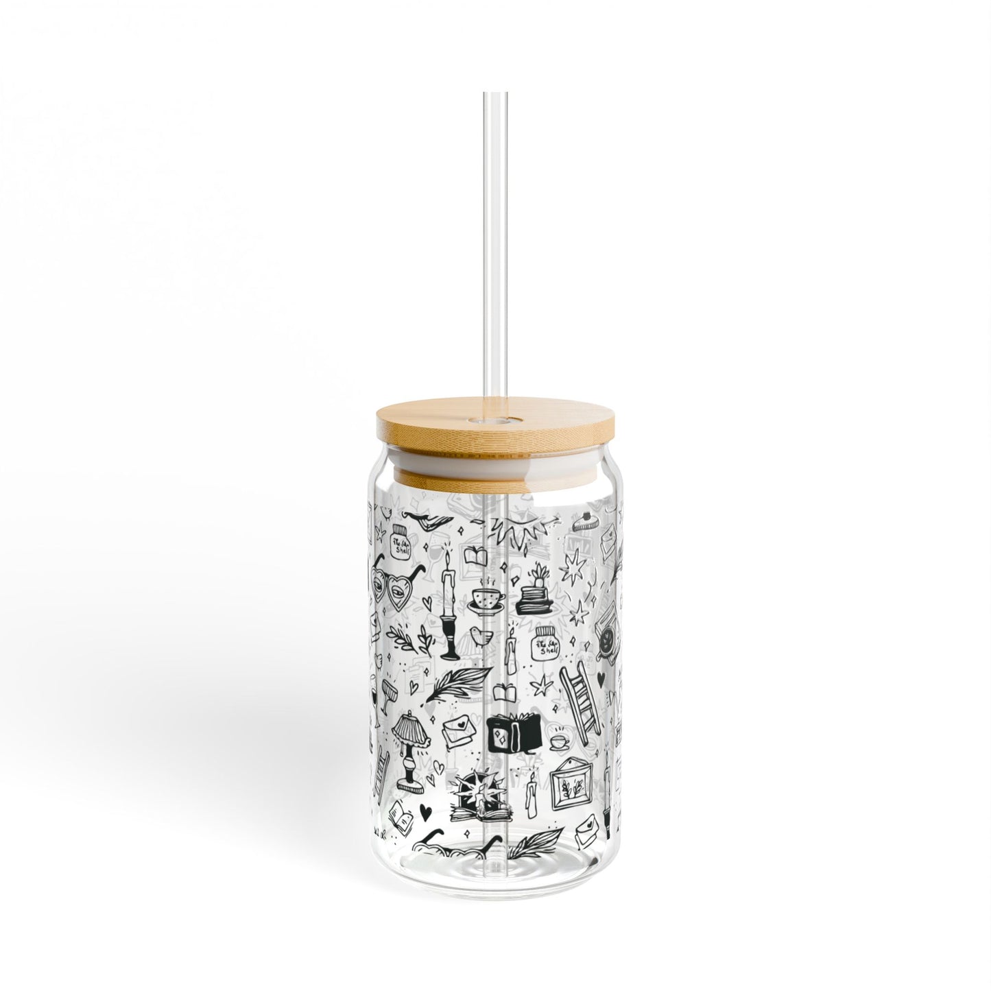 Clear tumbler with black illustrations, wooden lid, and straw on a white background