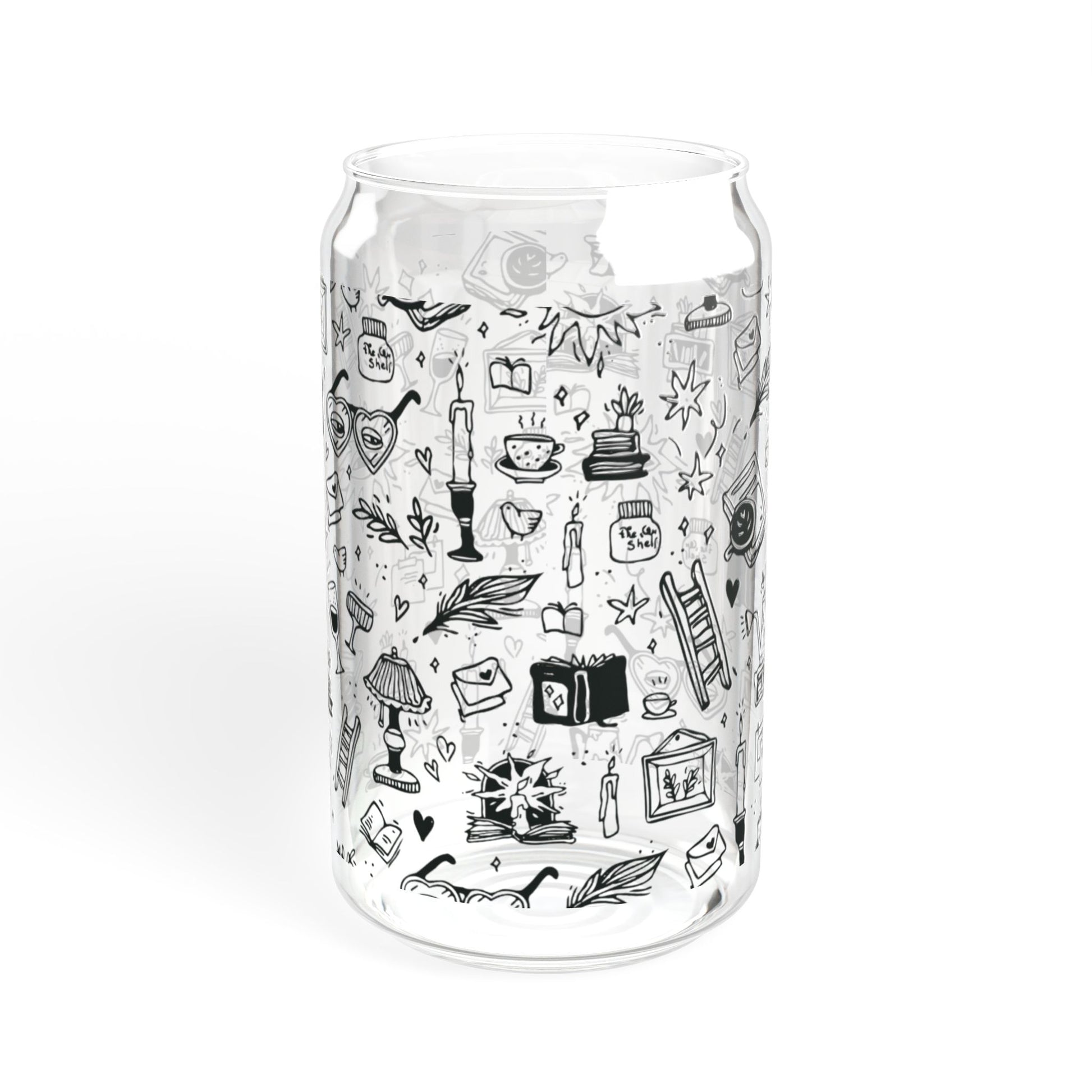Clear glass tumbler with black line art illustrations on a white background