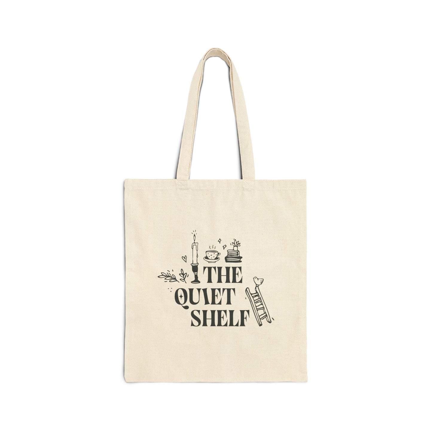 A beige cotton tote bag with 'THE QUIET SHELF' book haven logo printed in black.