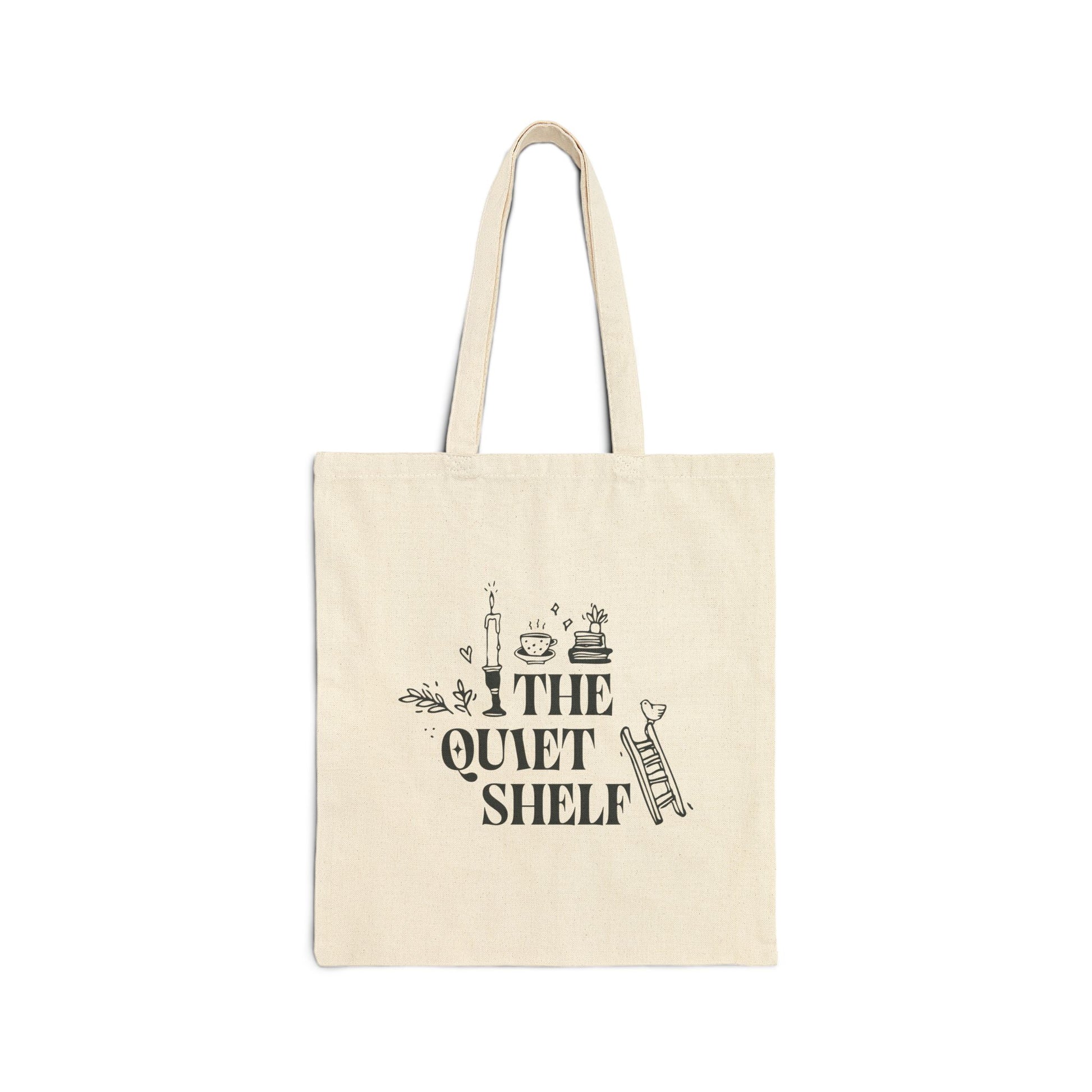 A beige cotton tote bag with 'THE QUIET SHELF' book haven logo printed in black.