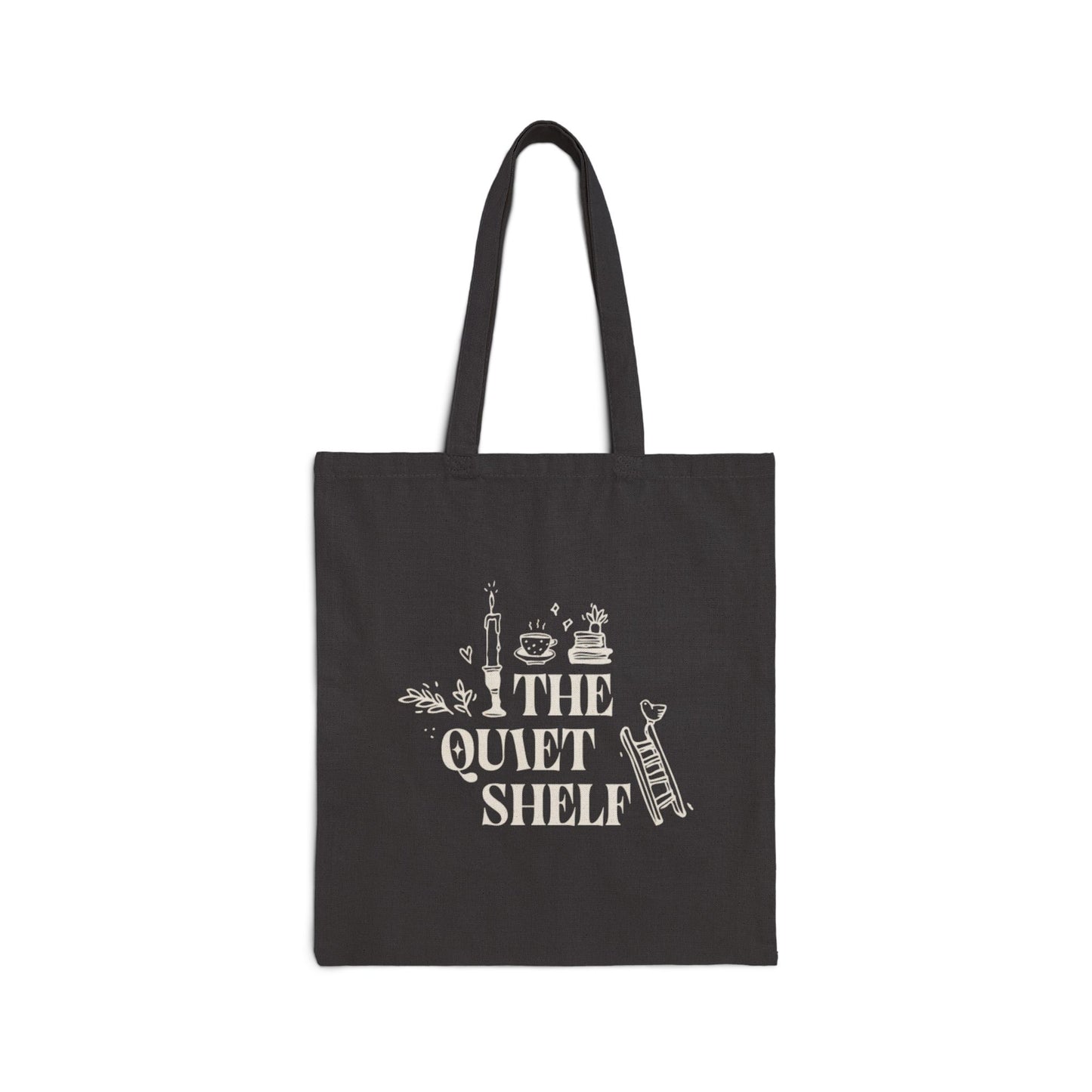 A black cotton tote bag with 'THE QUIET SHELF' book haven logo printed in black.
