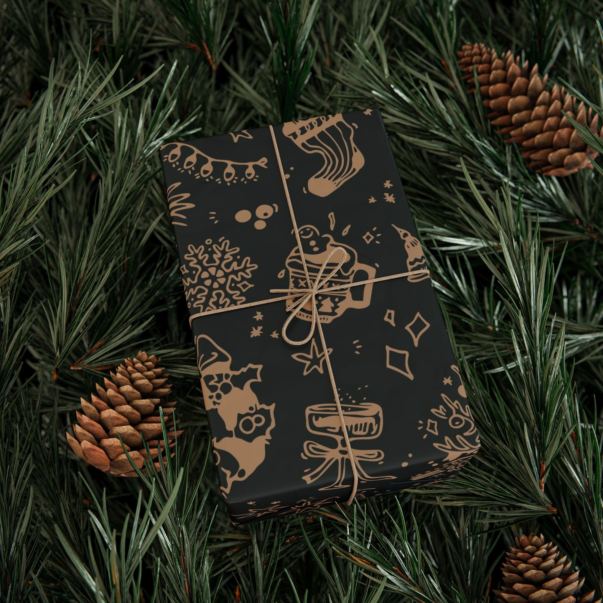 Darkly wrapped gift with festive patterns on a bed of pine needles and pine cones.