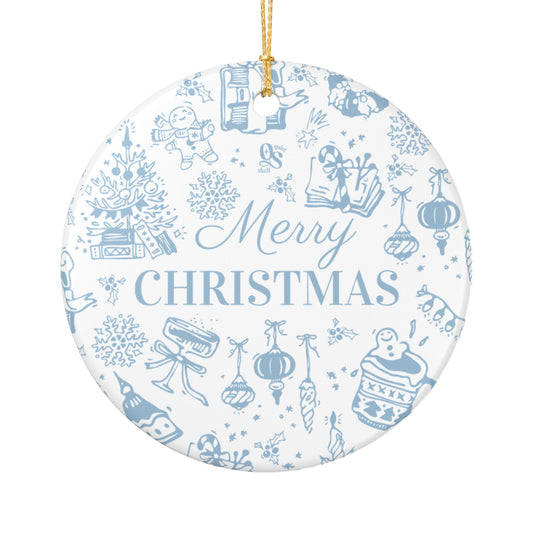 Ceramic ornament with blue Christmas illustrations and 'Merry Christmas' text on a white background