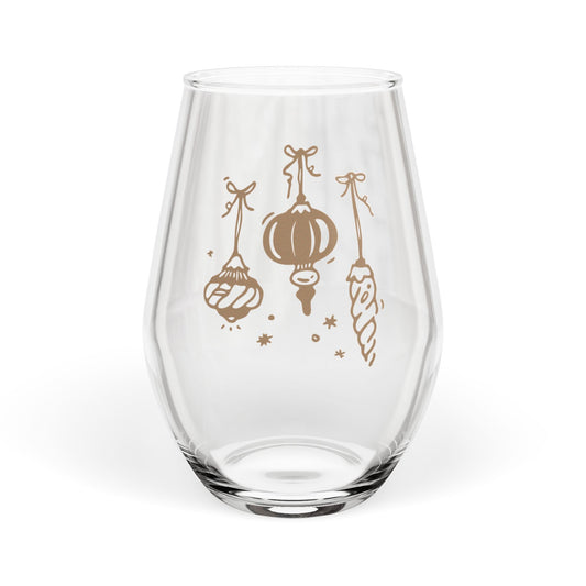 Clear glass with gold decorative elements on a white background