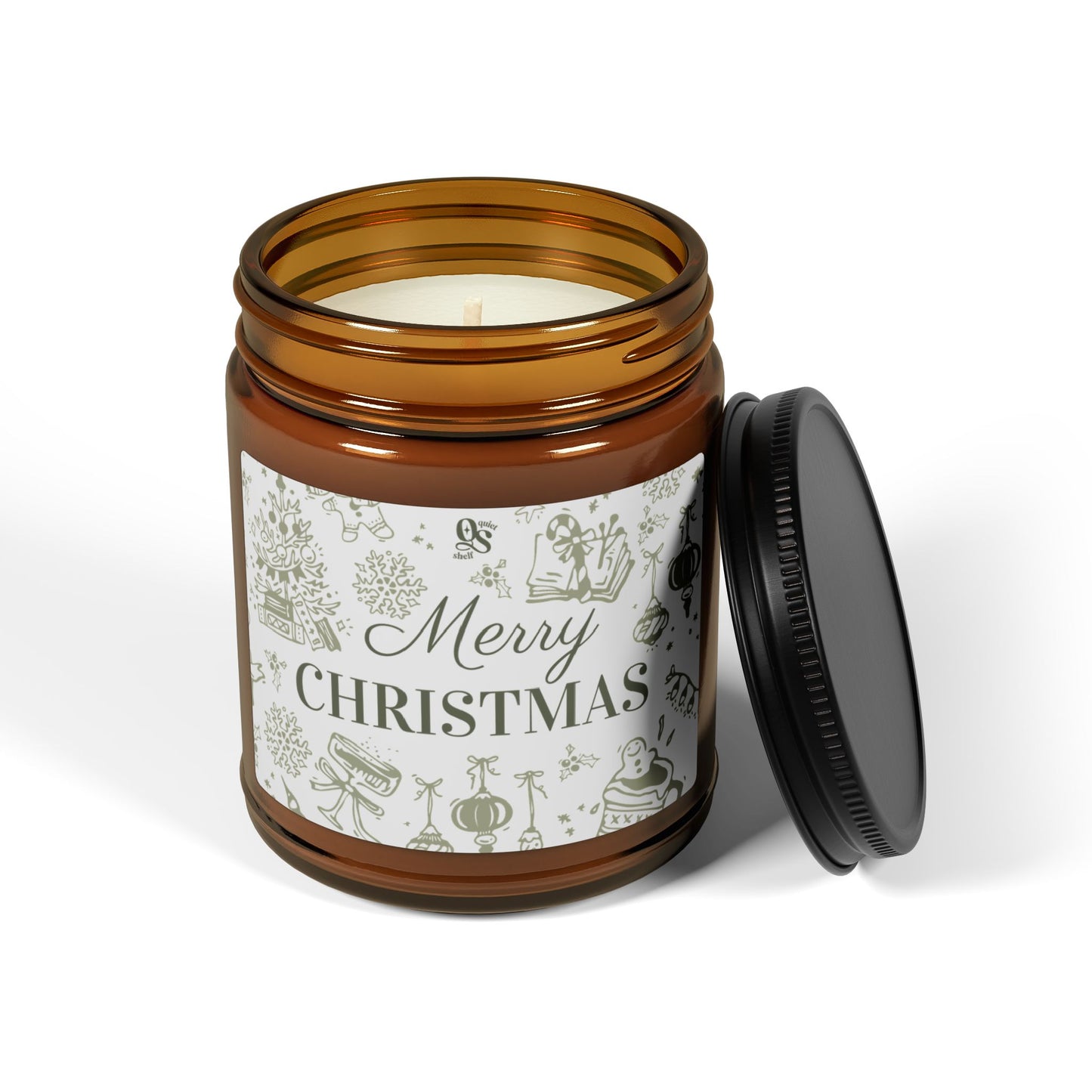 Candle in an amber jar with a 'Merry Christmas' label on a white background