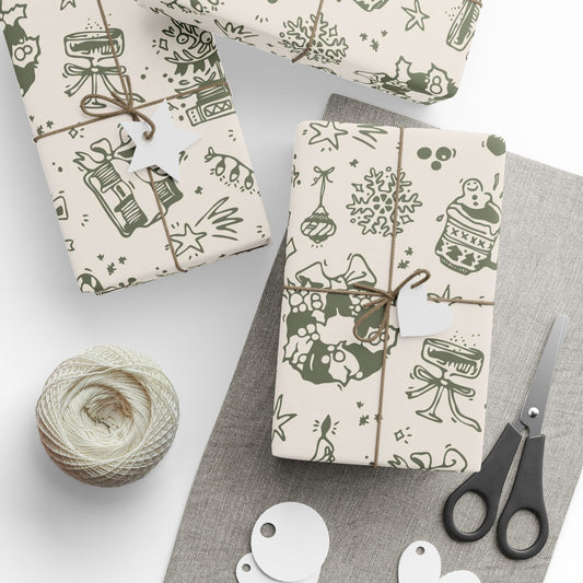 Gift boxes wrapped in patterned paper with scissors and yarn on a gray surface