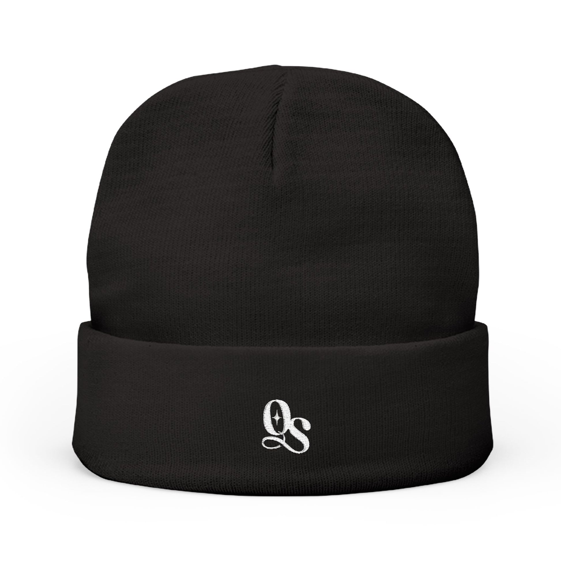 A black cuffed beanie with The Quiet Shelf's 'QS' monogram in embroidery on the front.