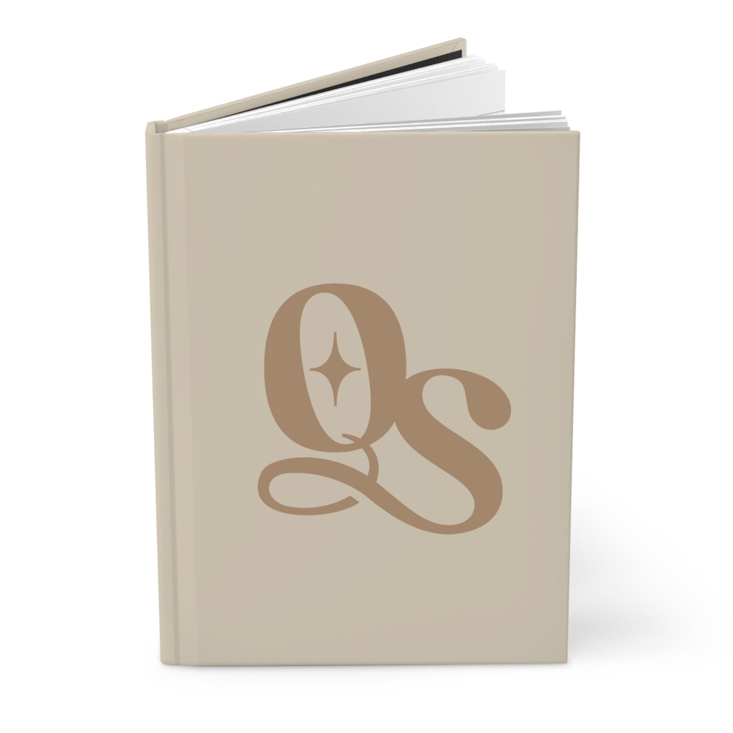 Beige notebook with a decorative monogram on a white background