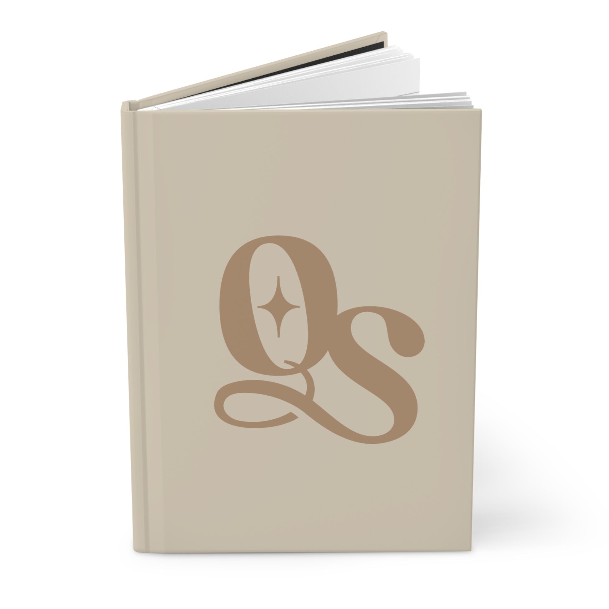 Beige notebook with a decorative monogram on a white background