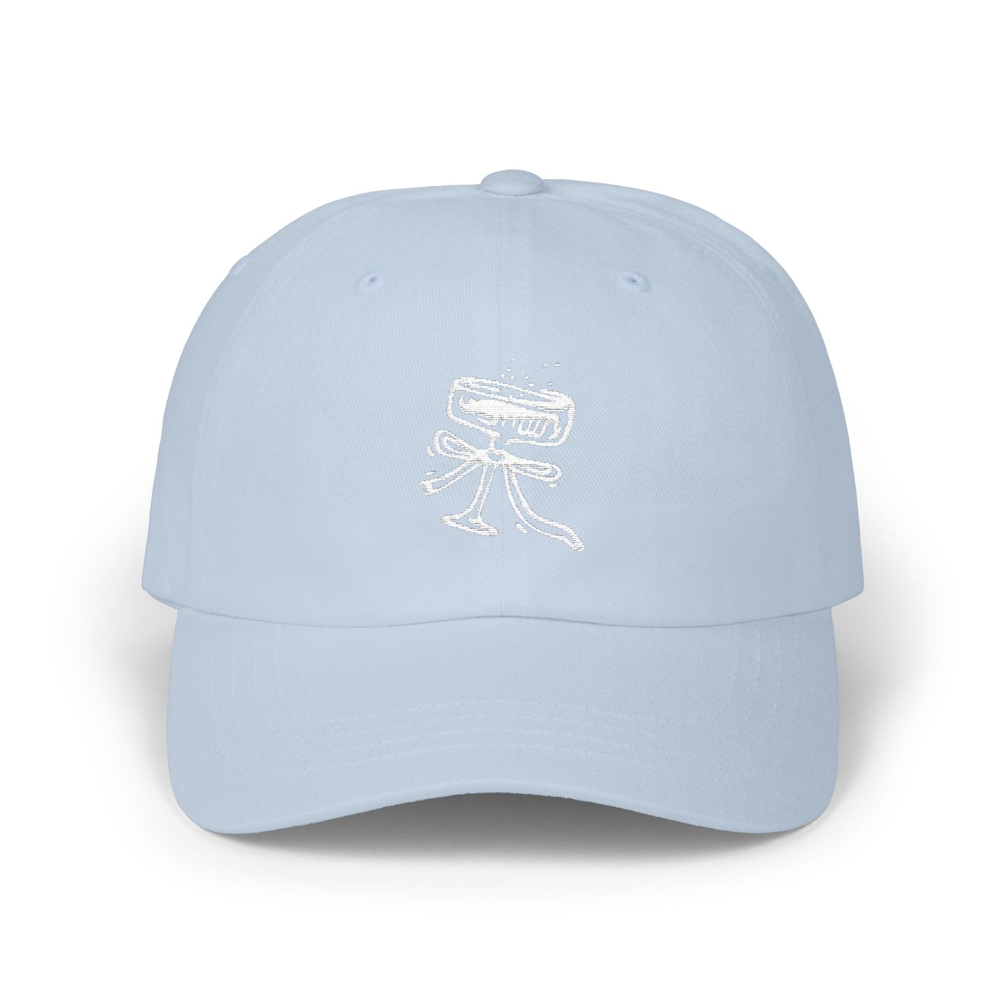 Light blue cap with white embroidered design on a white background