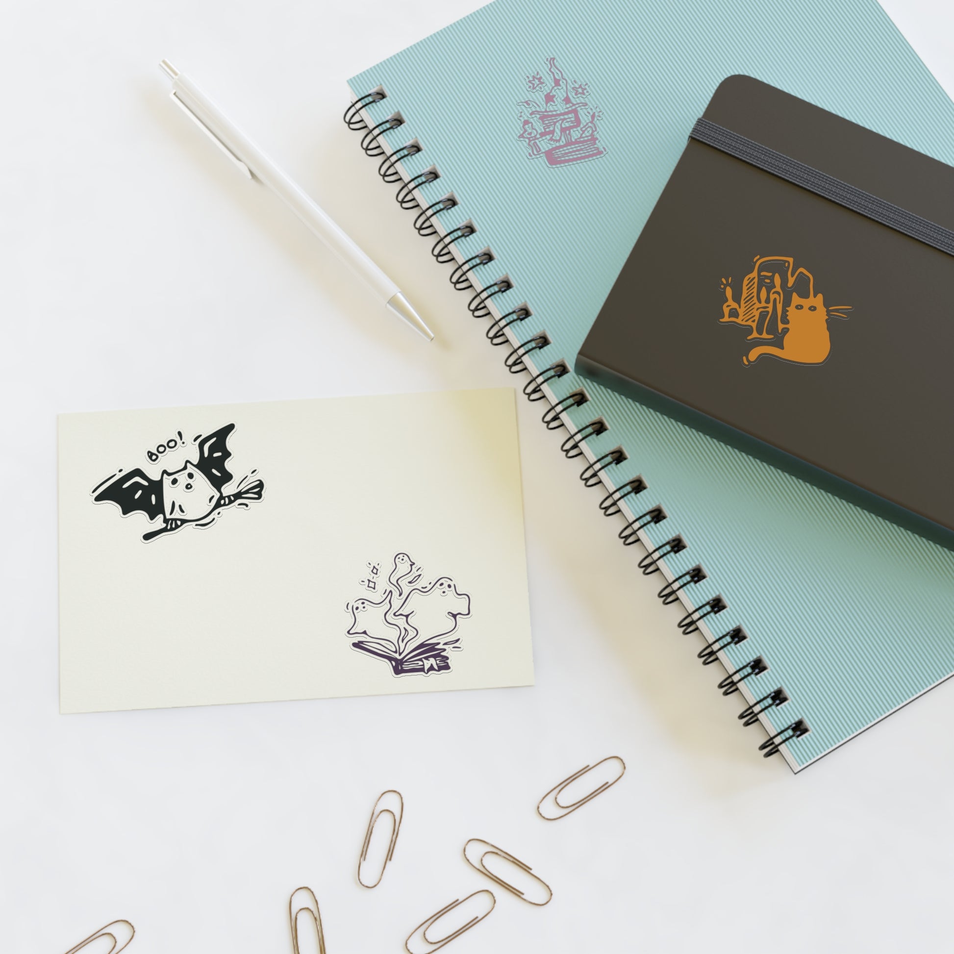 Notebooks with stickers on a white background