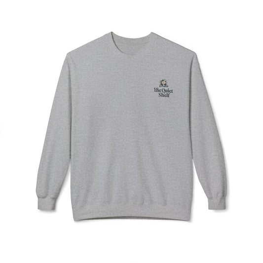 A gray crewneck sweatshirt with 'The Quiet Shelf' logo on the upper left front.