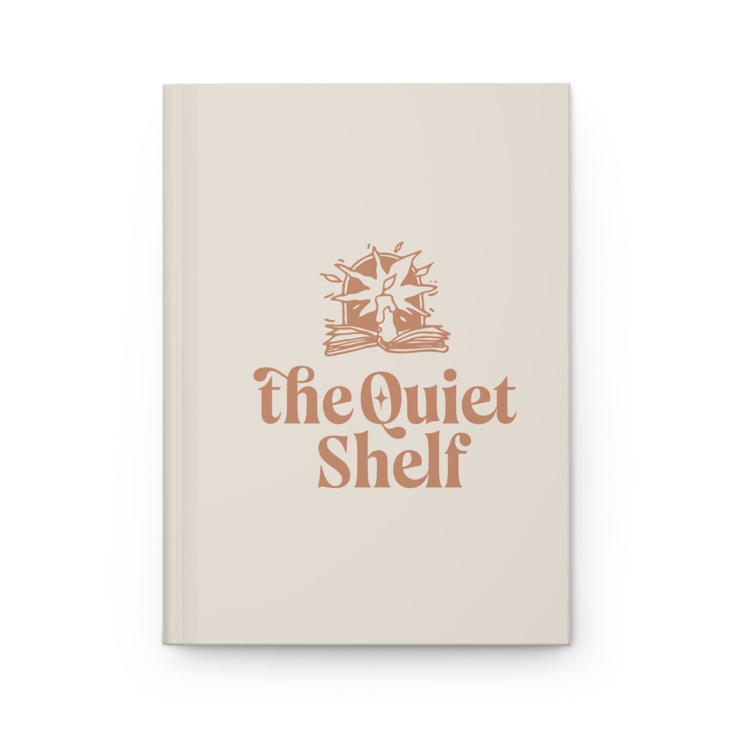 A beige hardcover journal with 'The Quiet Shelf' logo printed in the center in a minimalist style.