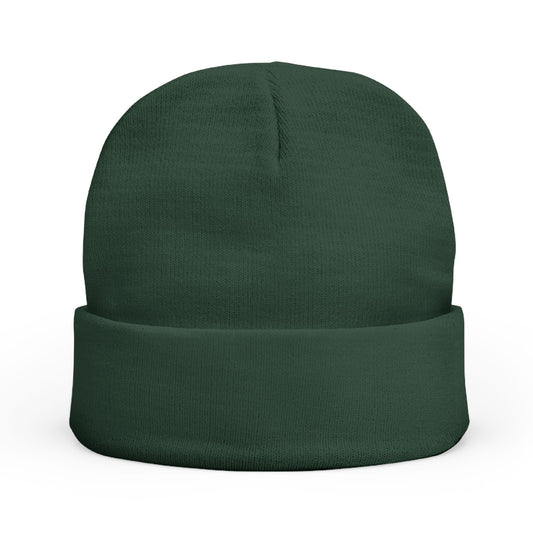 Green beanie hat on a white background
