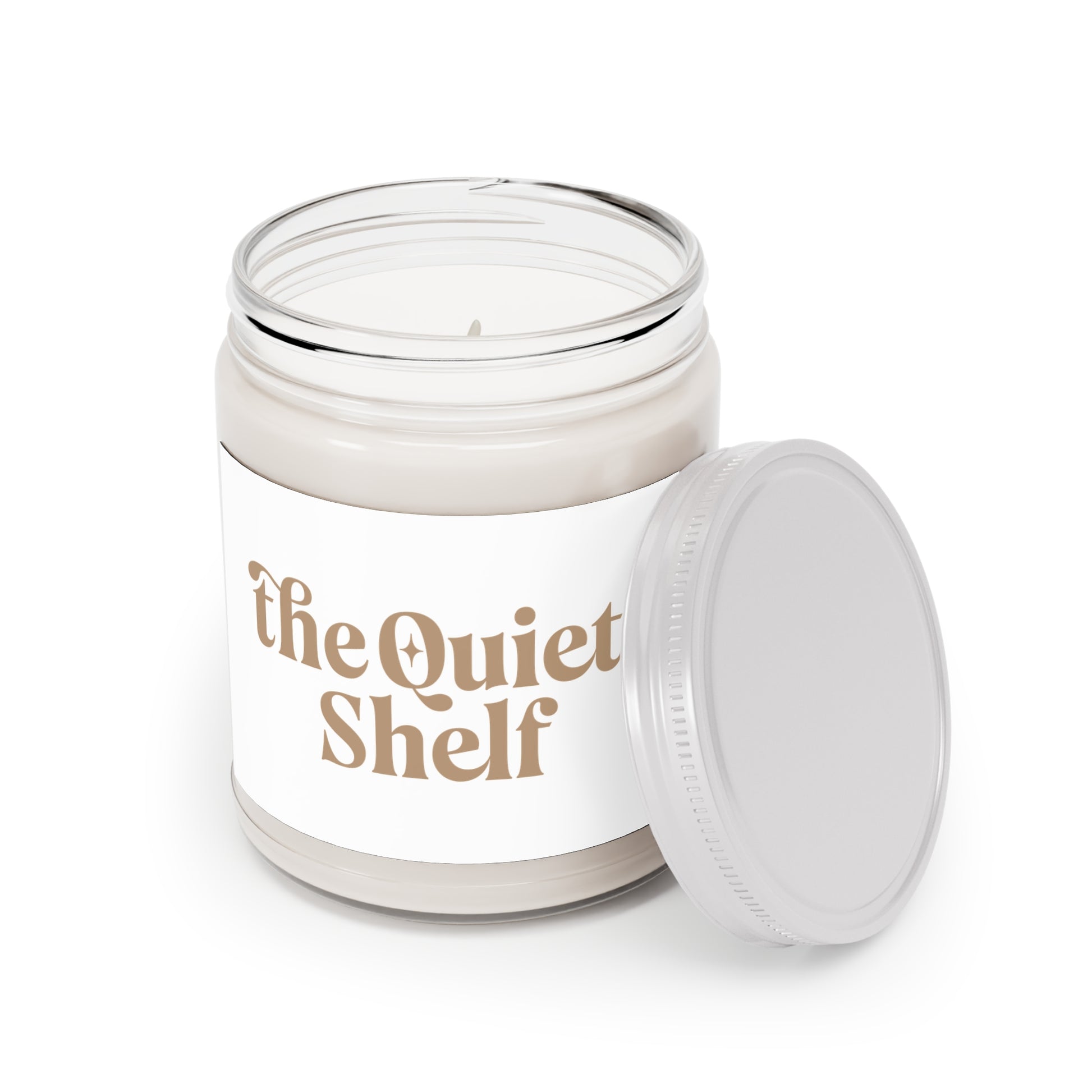 Candle jar with 'the Quiet Shelf' branding on a white background