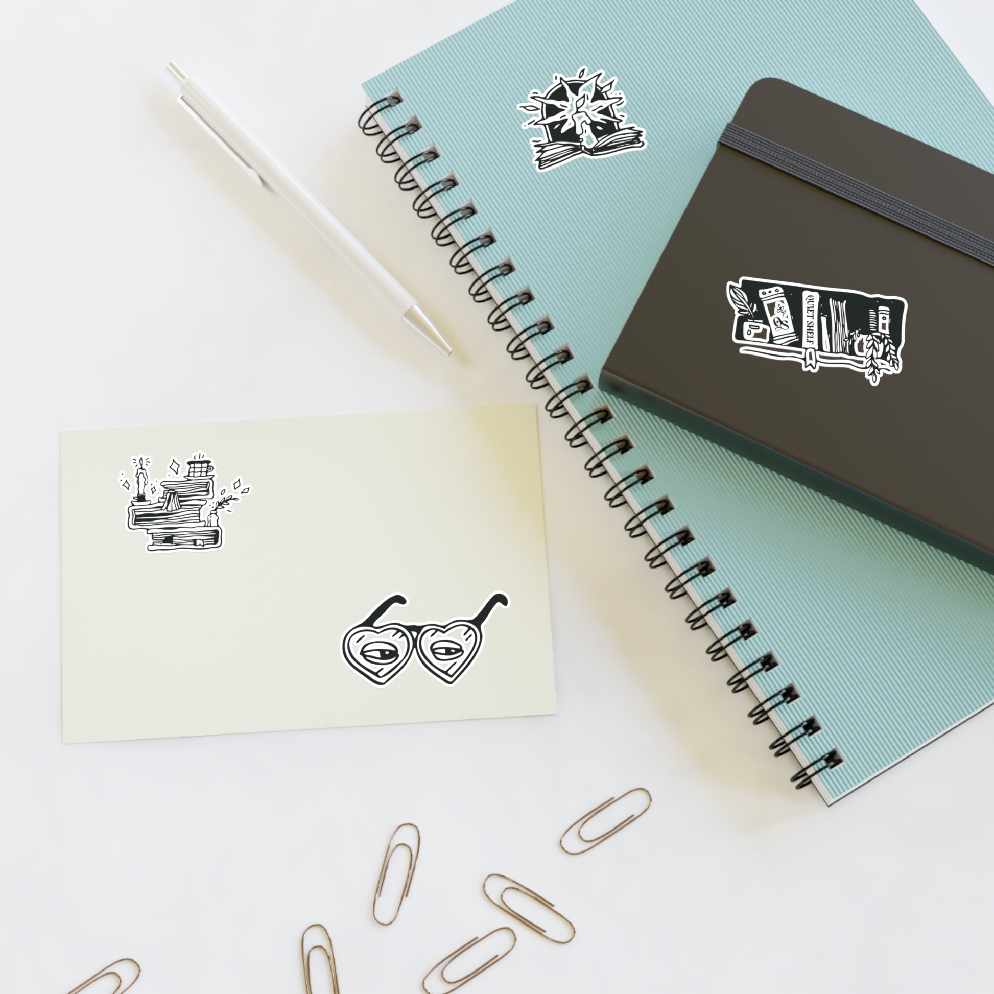 Notebooks with stickers on a white background