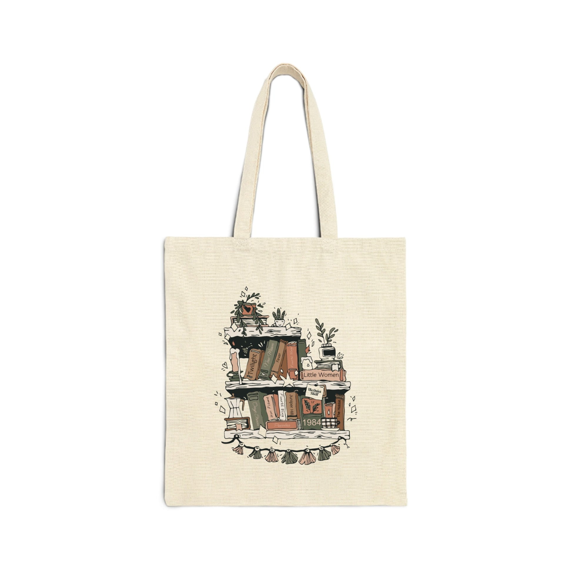 Beige tote bag with a printed design of a cozy book nook on a white background