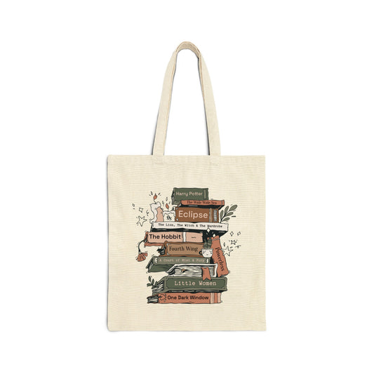 Tote bag with book stack design on a white background