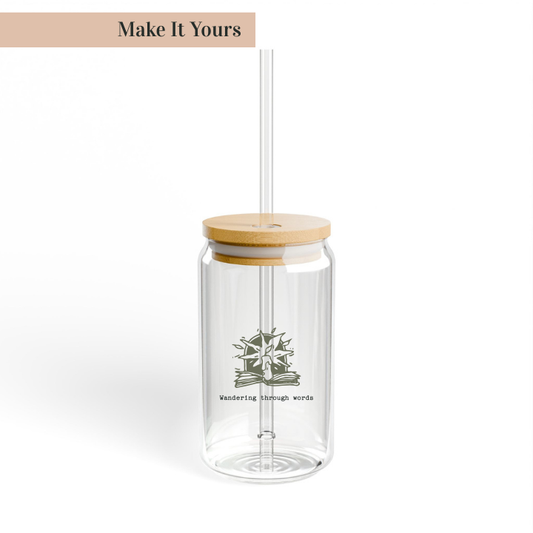 A clear glass with a wooden lid, featuring a custom design, alongside a straw, with the text 'Make It Yours' at the top.