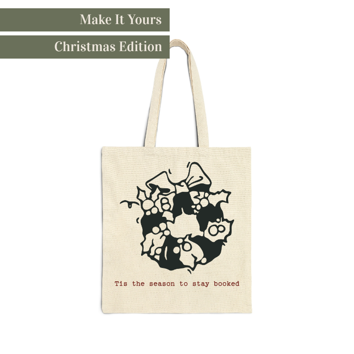 Beige tote bag with Christmas wreath design and text on a white background