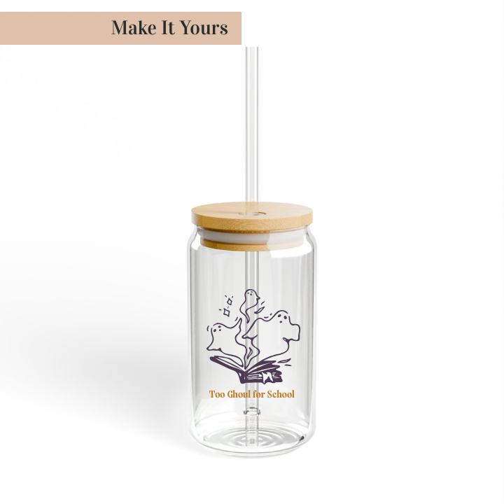 Clear tumbler with wooden lid and straw, featuring a design and text on a white background.