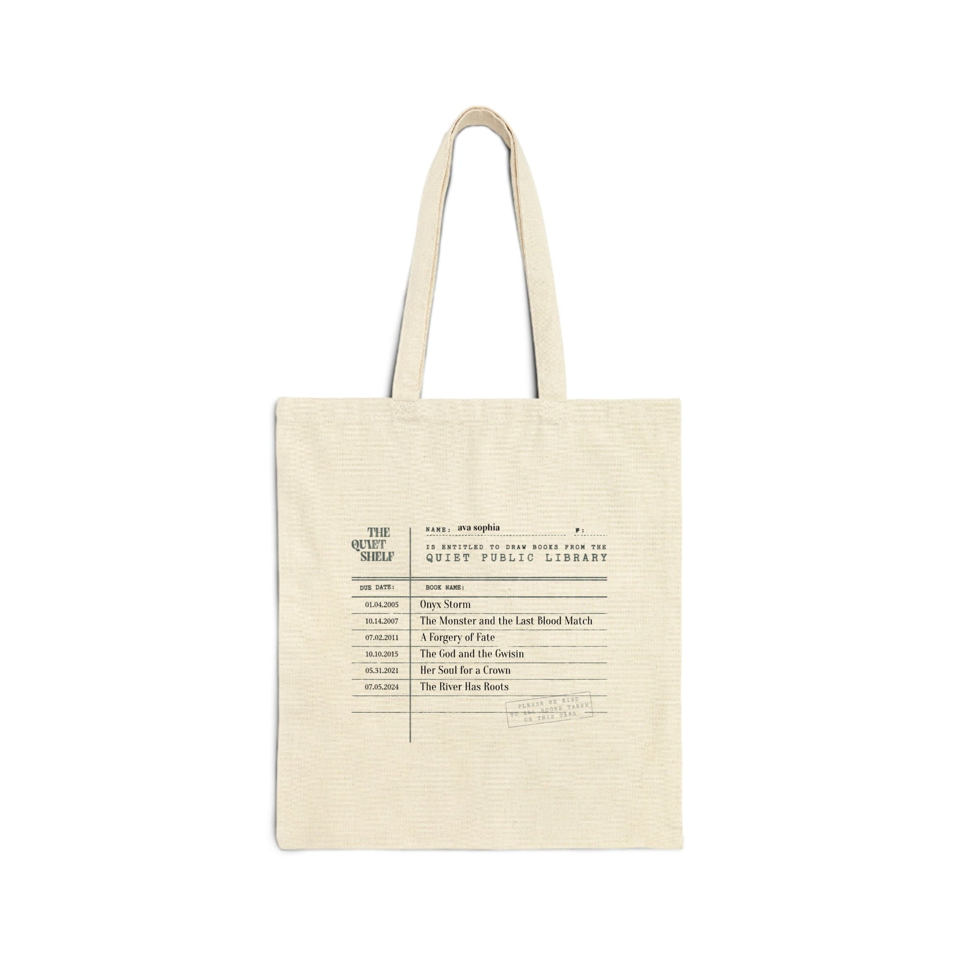 Beige tote bag with printed text on a white background