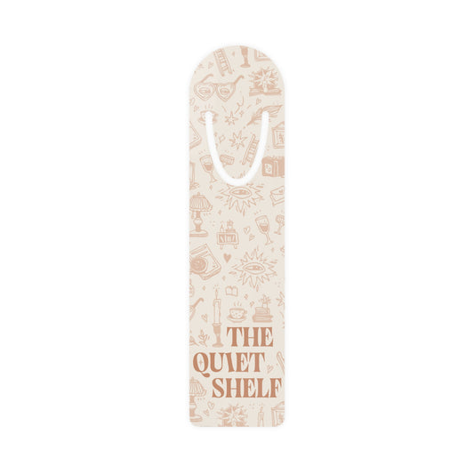 Decorative bookmark with 'The Quiet Shelf' text on a white background